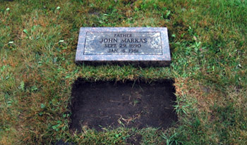Pry up grave marker and remove from hole. 